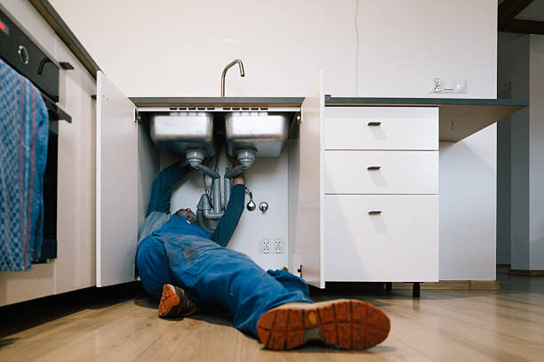 Professional Emergency Plumber technician working in Richton, MS